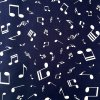 white musical notes on navy