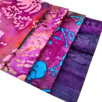 Included in this deal: big purple batik fabric fat quarter bundle