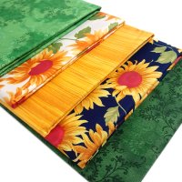 Included in this deal: green field sunflowers fabric bundle