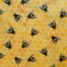 bees on yellow honeycomb