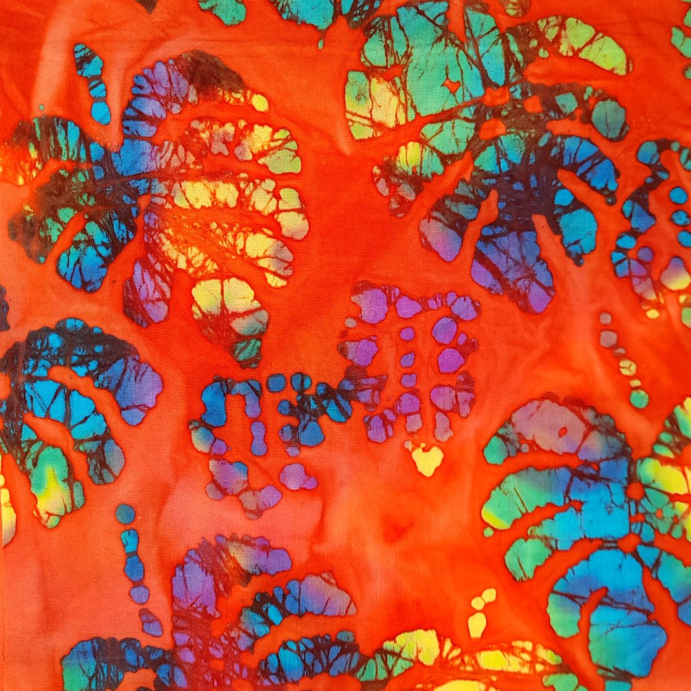 100% Cotton Floral On Orange Batik Design - Clearance 115cm X 50cm